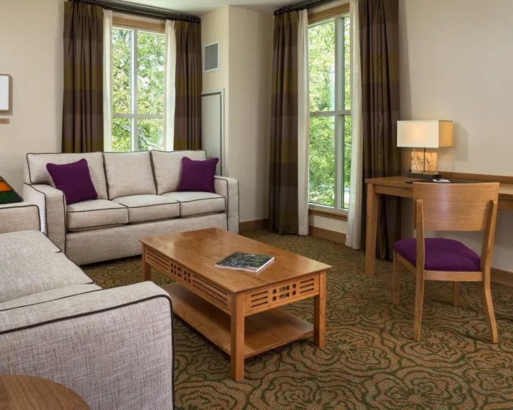 Suite living area with two couches at The Inn at Swarthmore