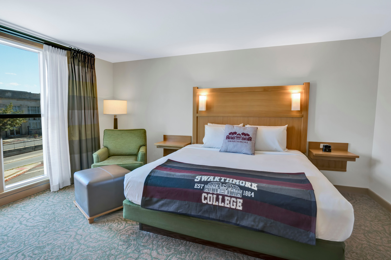 Inn at Swarthmore guest room with a Swarthmore College blanket on the bed